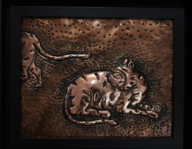 Resting Cat — Relief on copper by Indian artist B. Jayaram